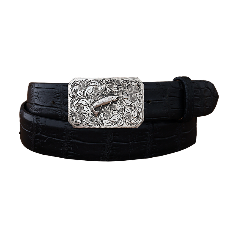 A black crocodile-embossed leather belt with a large, ornate silver-toned buckle featuring a detailed trout hand engraved design and swirling floral patterns, shown on a plain white background.